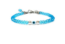 Cargar imagen en el visor de la galería, OCHRANA Pulsera ajustable de cristal facetado color azul con ojo turco y hematita
