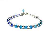 Cargar imagen en el visor de la galería, Pulsera ajustable de cristal facetado color azul y morado con hematita plateada
