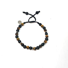 Cargar imagen en el visor de la galería, Ochrana Pulsera Ajustable con Ojo de Tigre, ágata, hematita y Piedra volcánica de 6mm - Ochrana México
