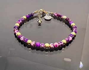 OCHRANA Pulsera de 17.5 cm de jaspe sedimento morado con hematita dorada de 4mm