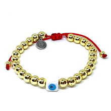 Cargar imagen en el visor de la galería, OCHRANA Pulsera ajustable de hematita dorada de 6mm con ojo turco de ceramica e hilo rojo de macramé
