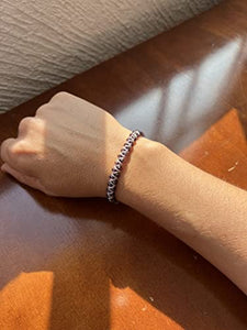 OCHRANA pulsera ajustable de macramé plateado con cristal facetado morado