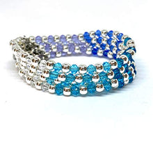 Cargar imagen en el visor de la galería, Pulsera ajustable de cristal facetado color azul y morado con hematita plateada
