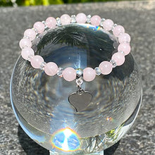 Cargar imagen en el visor de la galería, OCHRANA Pulsera elástica de 17.5 cm de cuarzo rosa de 6mm con cristal facetado y dije de corazón
