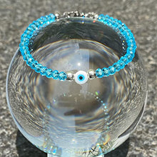 Cargar imagen en el visor de la galería, OCHRANA Pulsera ajustable de cristal facetado color azul con ojo turco y hematita
