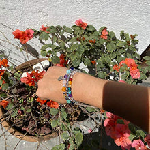 Cargar imagen en el visor de la galería, Pulsera elástica de 17.5 cm de hematita con piedras de colores y dije de acero de Om de 8mm - Ochrana México
